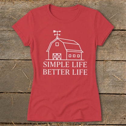 Red t-shirt with white barn graphic and text "SIMPLE LIFE BETTER LIFE".