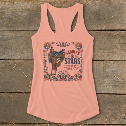 Peach tank top with a saddle and text that reads "Saddles & Stars Since 1776".