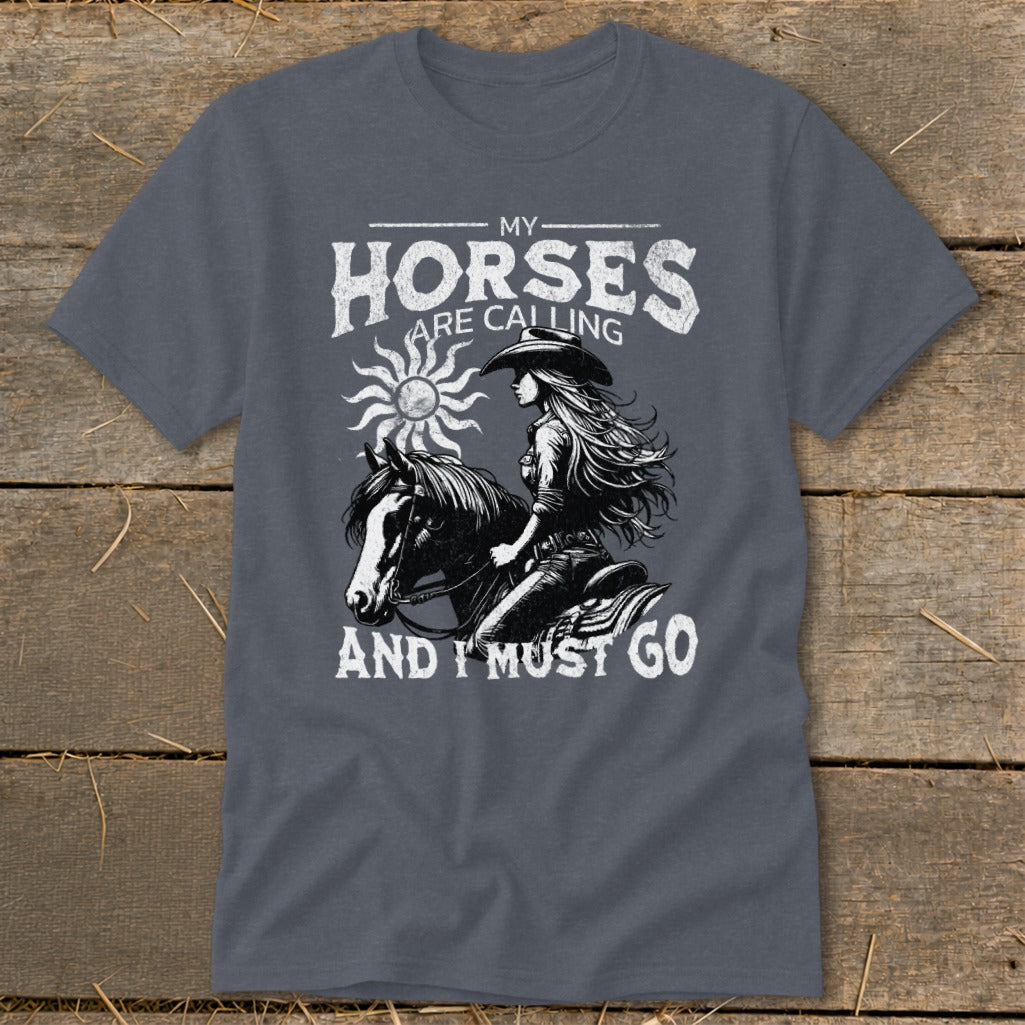"My Horses Are Calling And I Must Go" text and graphic on a gray t-shirt.