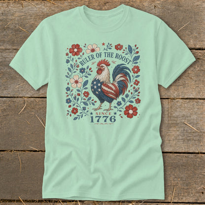 Rooster with American flag pattern, surrounded by flowers and text "RULER OF THE ROOST SINCE 1776".