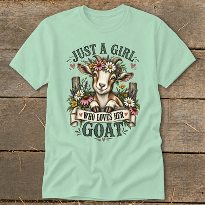 Light green t-shirt featuring a goat with flowers and the text "Just a Girl Who Loves Her Goat".