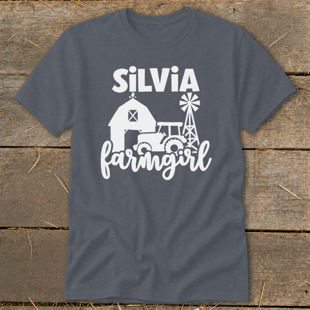 Dark grey t-shirt with "Silvia farmgirl" text and barn, tractor, and windmill graphics.