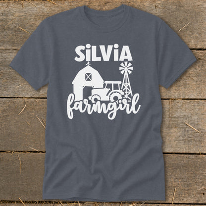 Dark grey t-shirt with "Silvia farmgirl" text and barn, tractor, and windmill graphics.