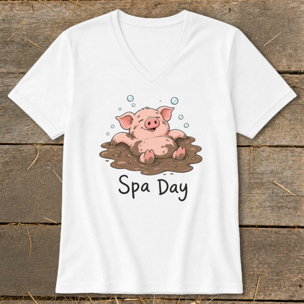 White t-shirt with cartoon pig in mud and text "Spa Day".