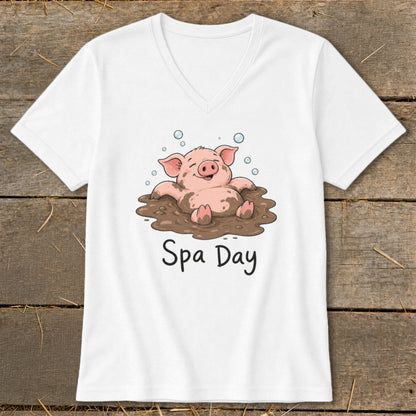 White t-shirt with cartoon pig in mud and text "Spa Day".