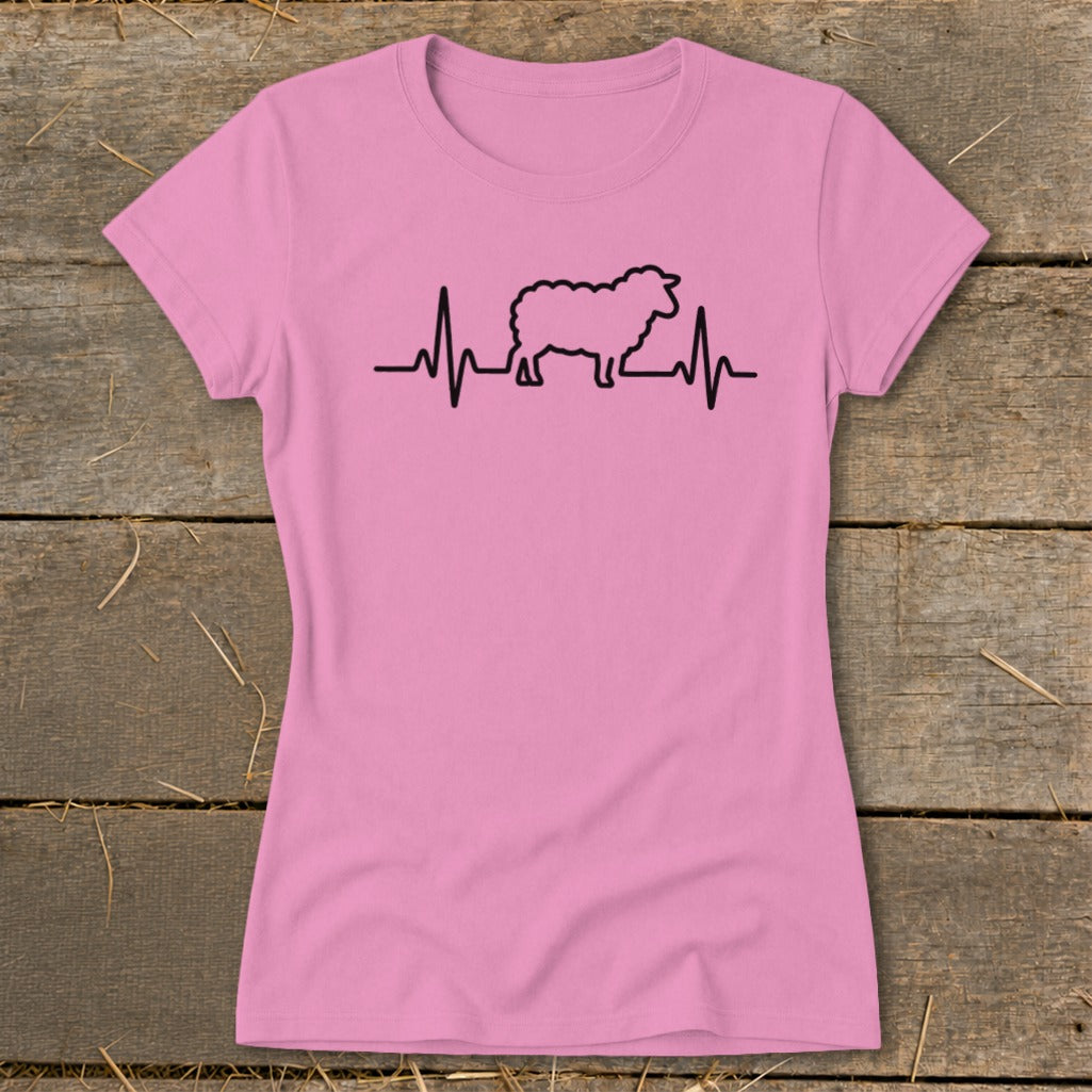 Pink short-sleeved t-shirt featuring a black graphic of a sheep integrated into a heartbeat line.