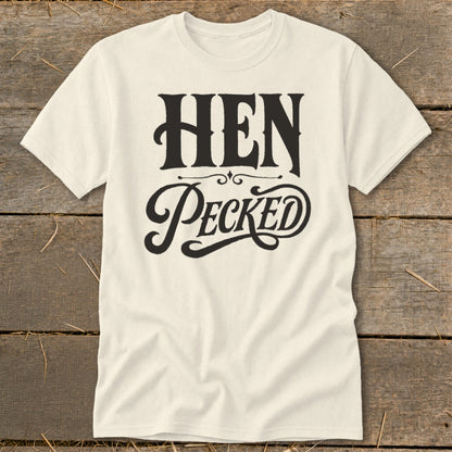 Cream t-shirt with "HEN PECKED" text in black gothic lettering.