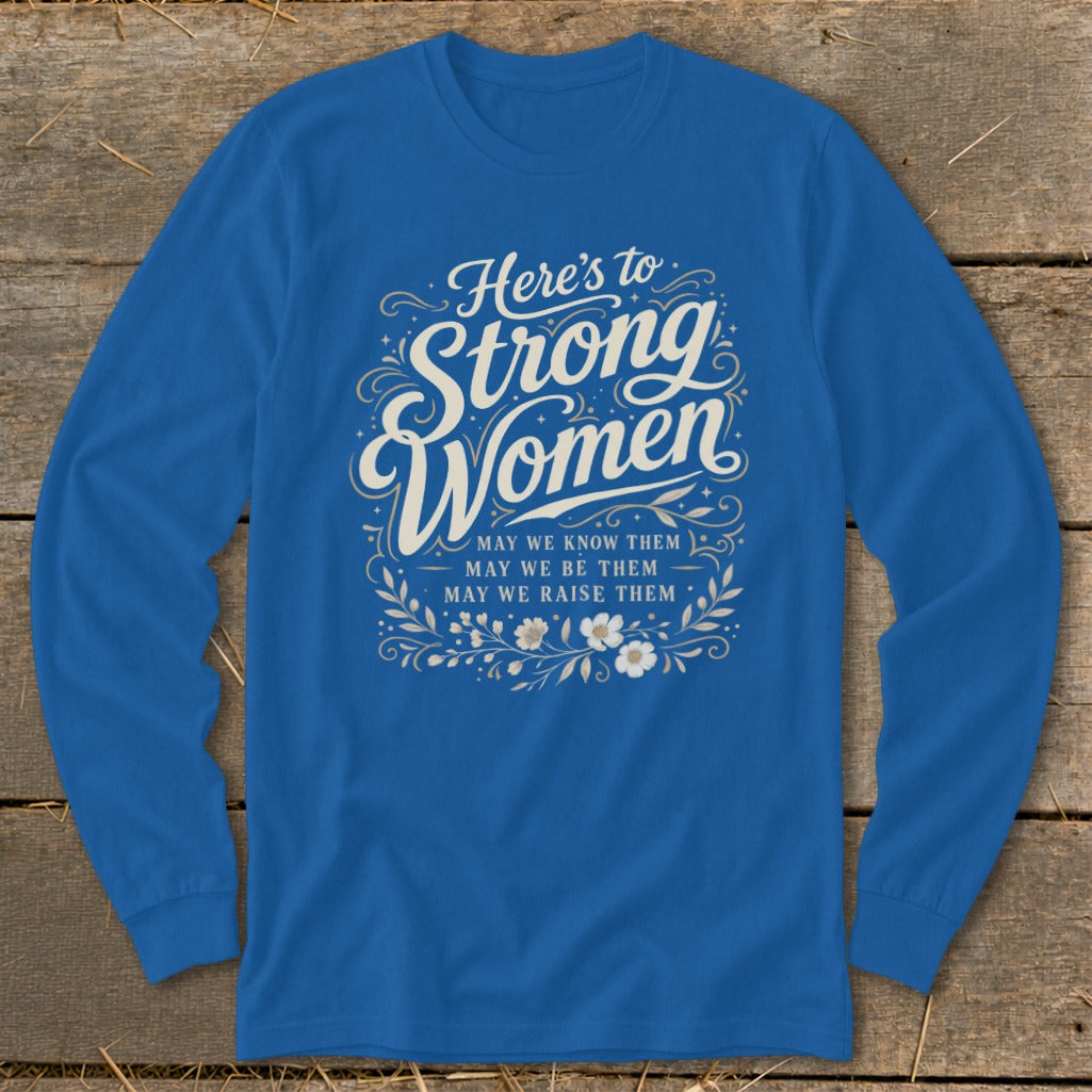 Blue long-sleeve shirt with "Here's to Strong Women" and floral design.