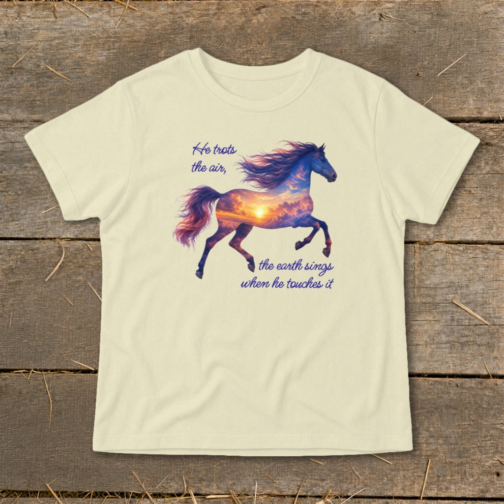 Cream-colored t-shirt featuring a running horse graphic filled with a sunset cloudscape and inspirational text.