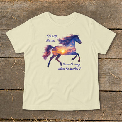 Cream-colored t-shirt featuring a running horse graphic filled with a sunset cloudscape and inspirational text.
