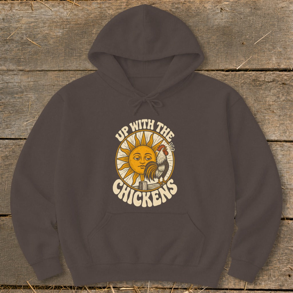 Dark brown hooded sweatshirt with a graphic of a sun, a rooster, and the text "UP WITH THE CHICKENS."