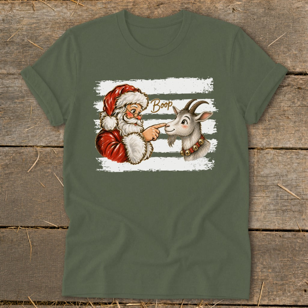 Santa Claus boops a goat's nose with the word "Boop" above them.