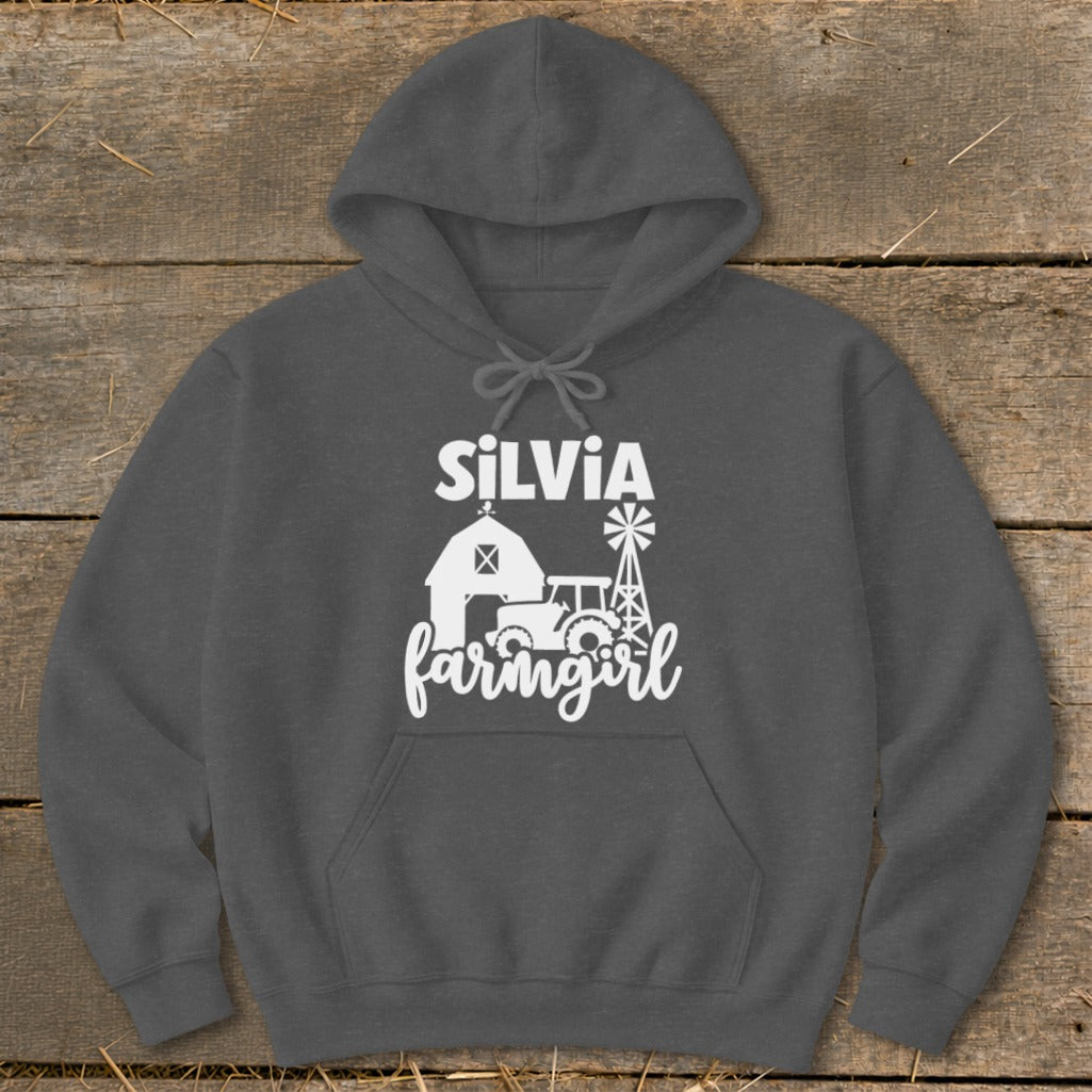 Dark gray hoodie with "SILVIA farmgirl" text and farm graphic.