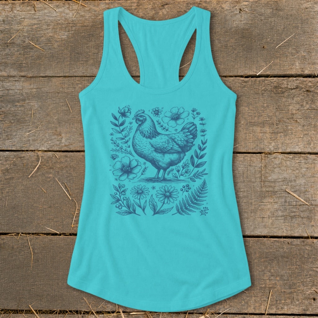 Teal tank top with a navy blue chicken and floral illustration.