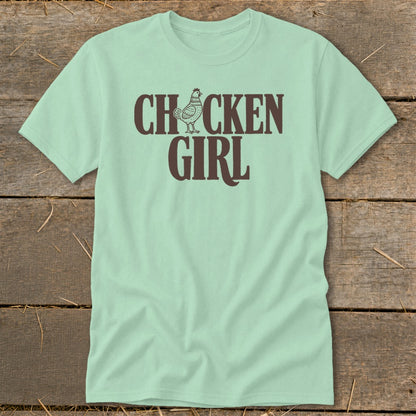 Light green t-shirt with brown text "CHICKEN GIRL" and a chicken illustration.