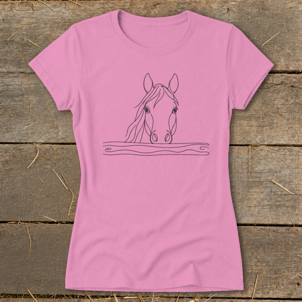 Pink t-shirt with a line drawing of a horse's head peeking over wavy lines.