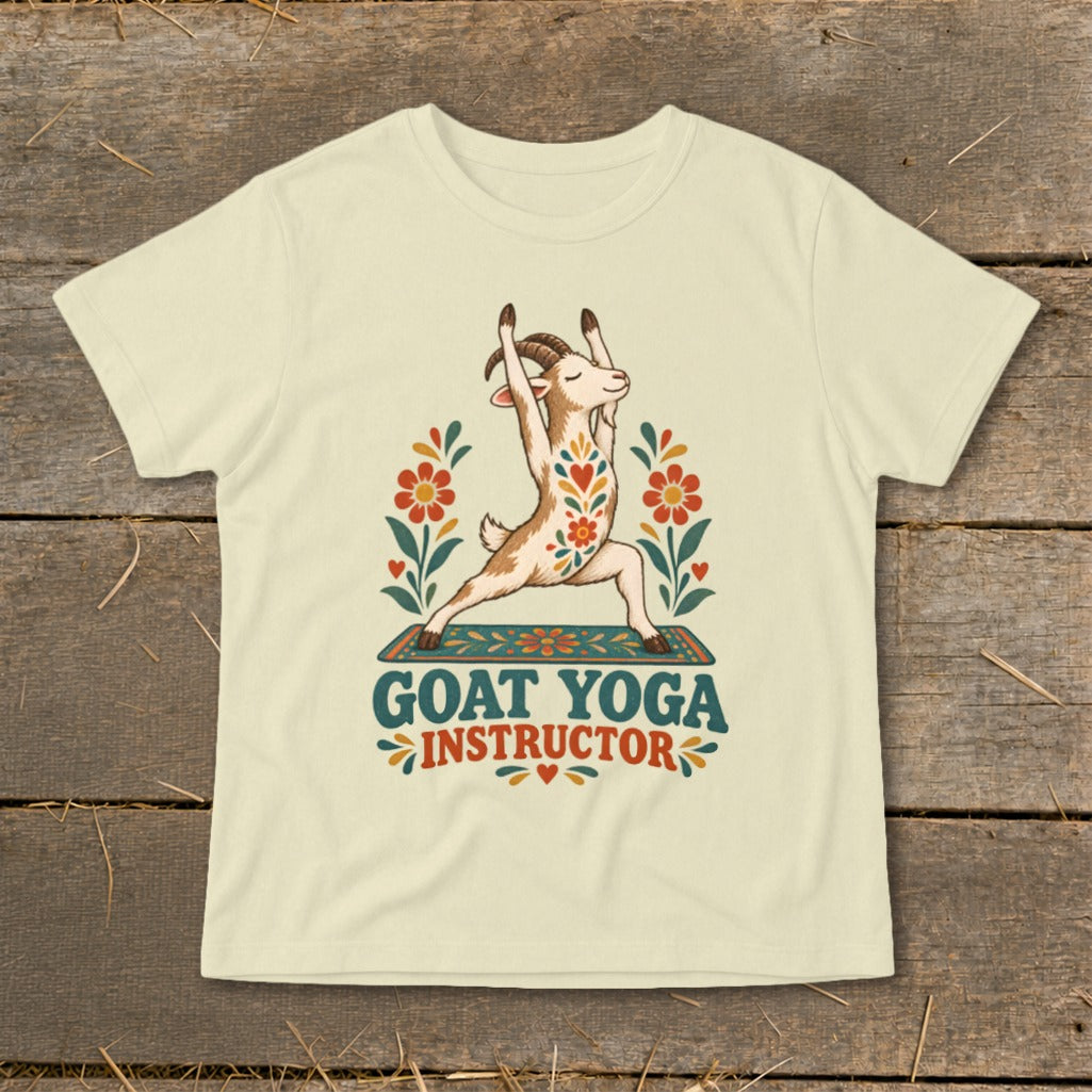 Cream t-shirt with a goat doing yoga with text "GOAT YOGA INSTRUCTOR".