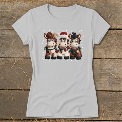 Light gray t-shirt with three cartoon horses wearing Christmas decorations.