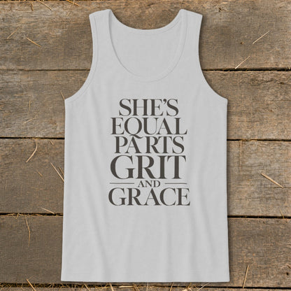 White tank top with "She's Equal Parts Grit and Grace" text in dark grey.