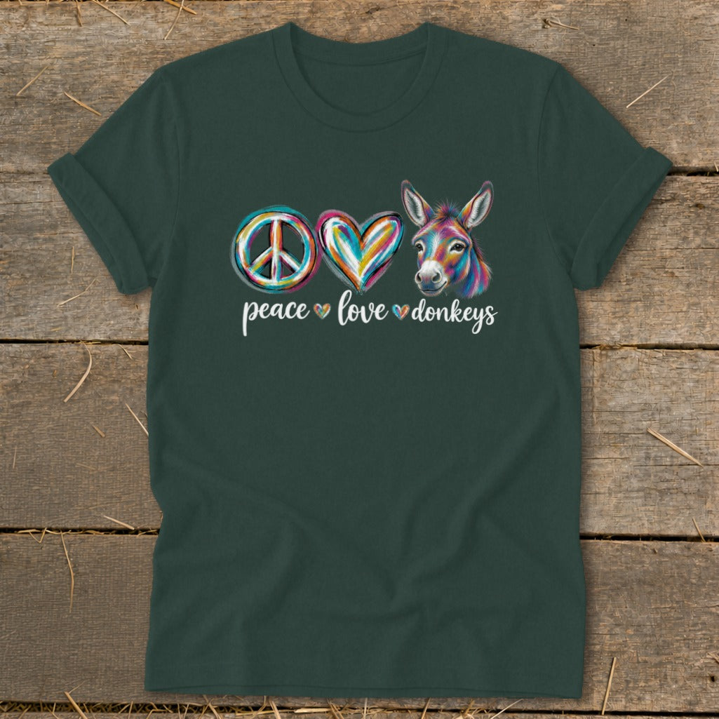 Dark green t-shirt with colorful peace sign, heart, and donkey graphic reading "peace love donkeys".