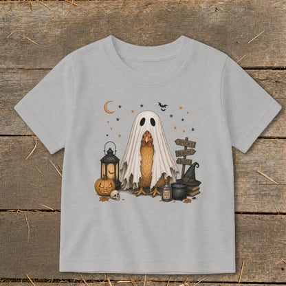 Chicken wearing a ghost costume with Halloween decorations and spooky signs.