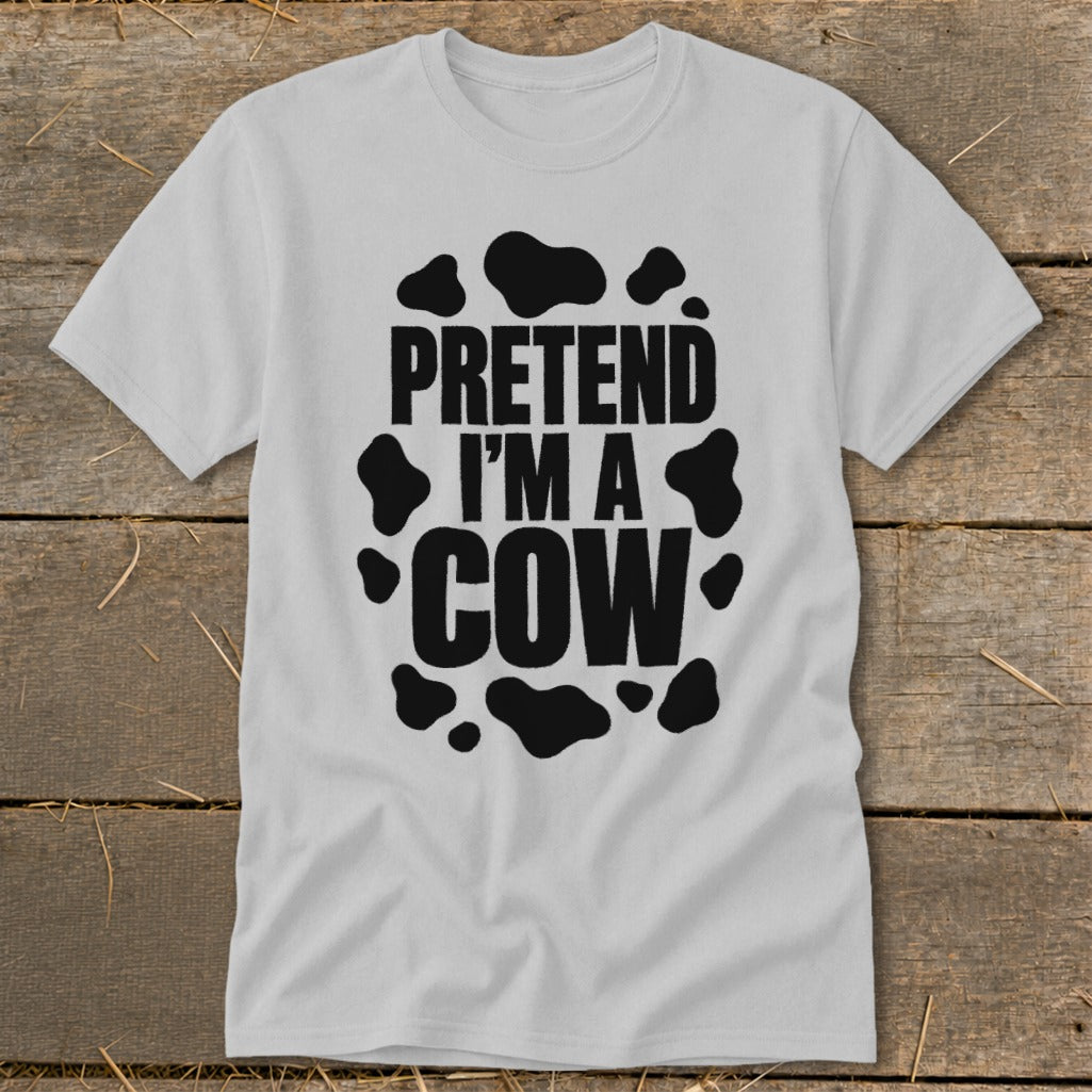 White t-shirt with black cow spots and "Pretend I'm a Cow" text.
