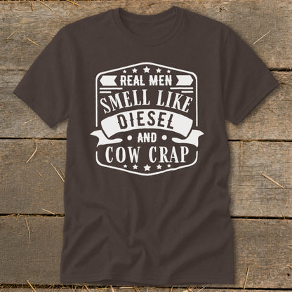 Brown t-shirt with white text "Real Men Smell Like Diesel And Cow Crap".