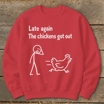 Red sweatshirt with white text "Late again The chickens got out" and cartoon drawings.