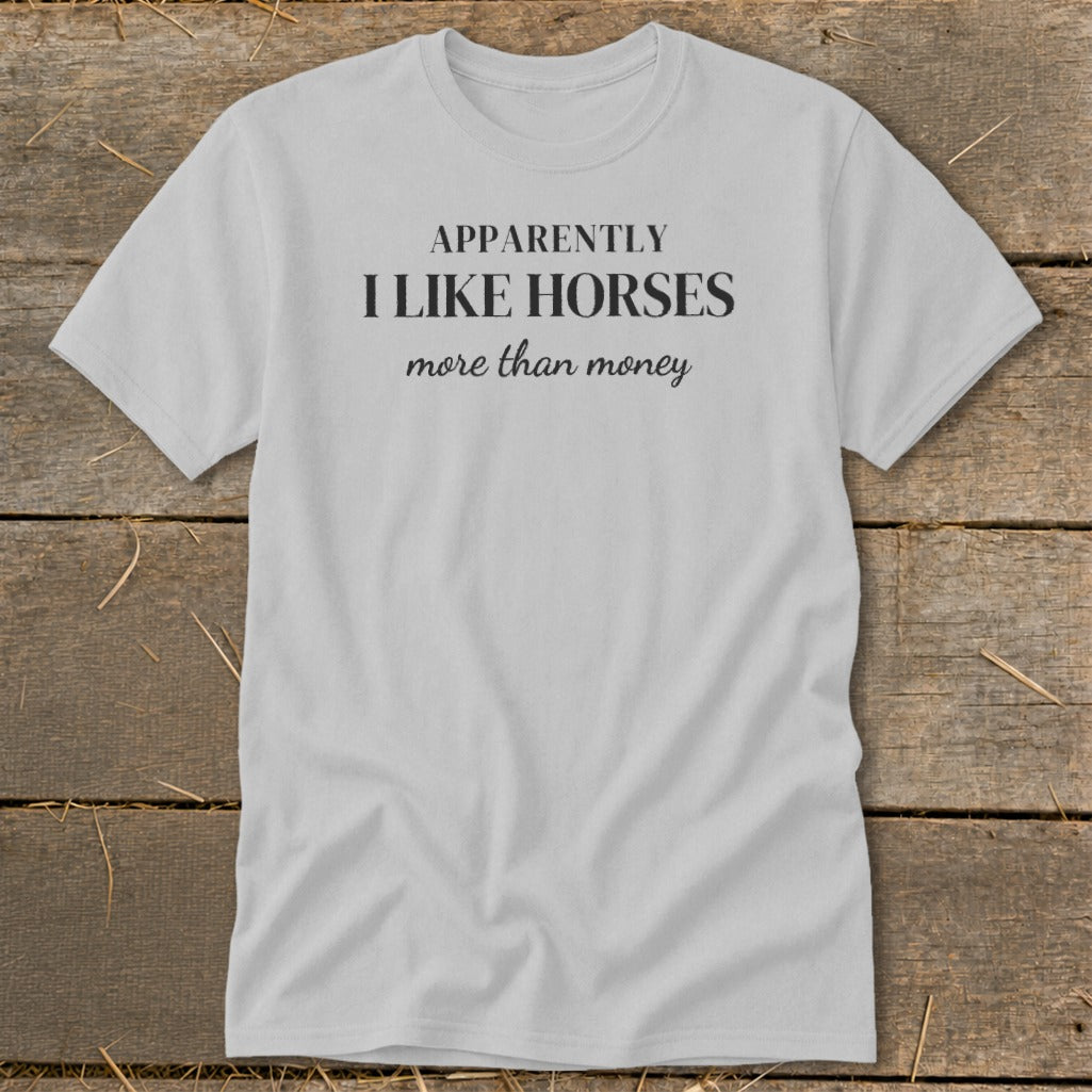 Light gray t-shirt with "APPARENTLY I LIKE HORSES more than money" text.