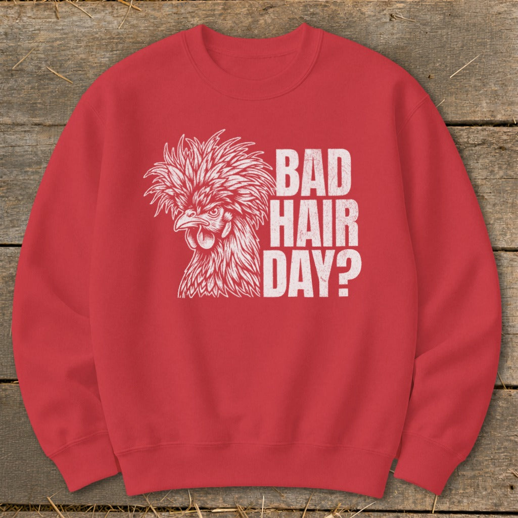Red sweatshirt with white graphic of a chicken and text "BAD HAIR DAY?".