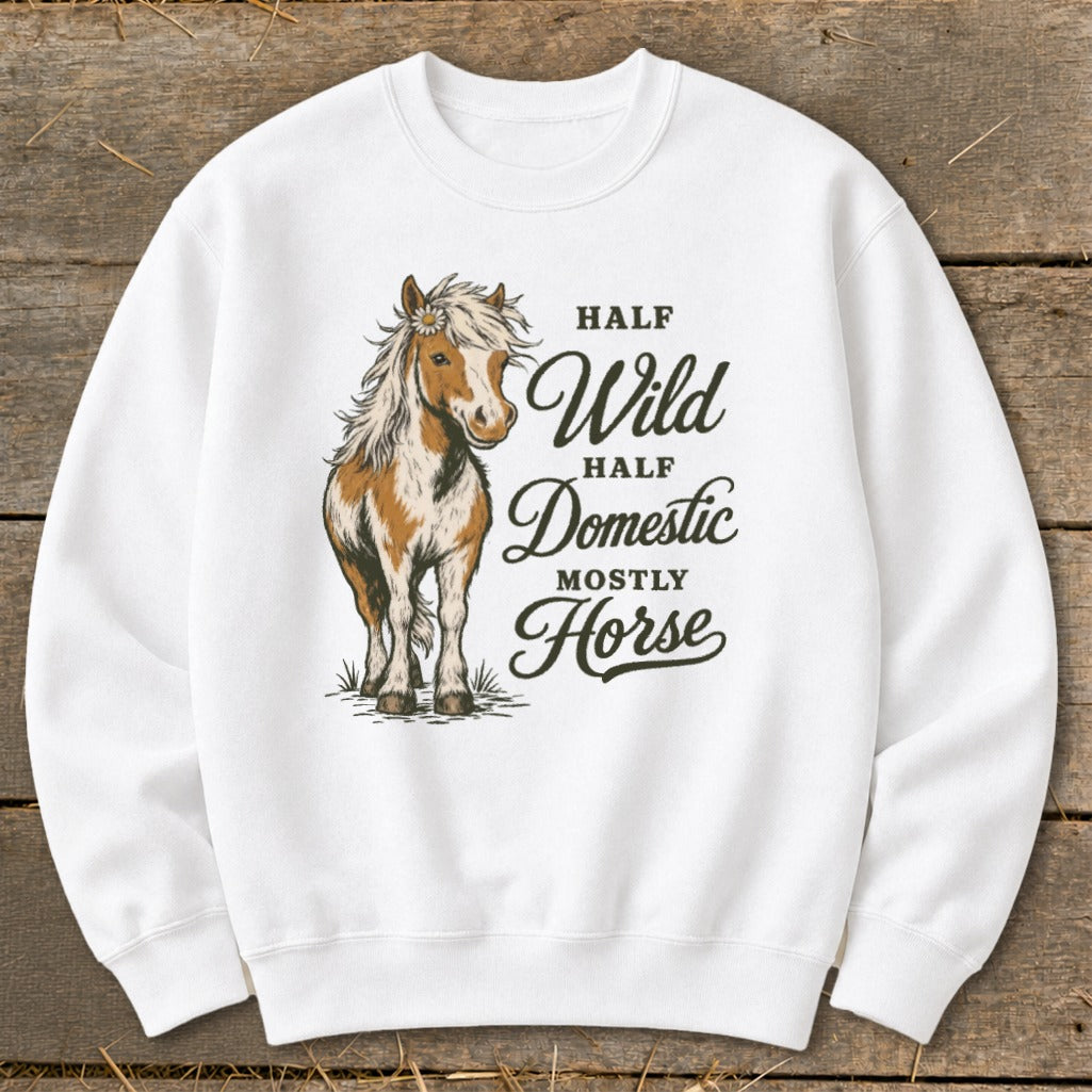 White sweatshirt with a brown and white horse illustration and text "Half Wild Half Domestic Mostly Horse".