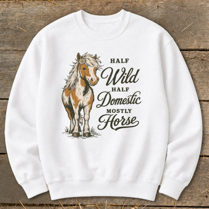 White sweatshirt with a brown and white horse illustration and text "Half Wild Half Domestic Mostly Horse".