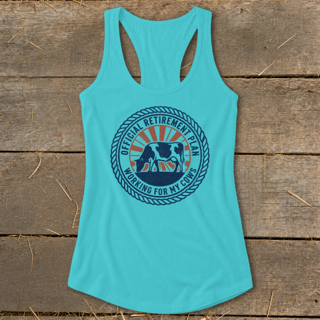 Turquoise tank top with a circular graphic of a cow grazing, text reads "Official Retirement Plan Working for My Cows".