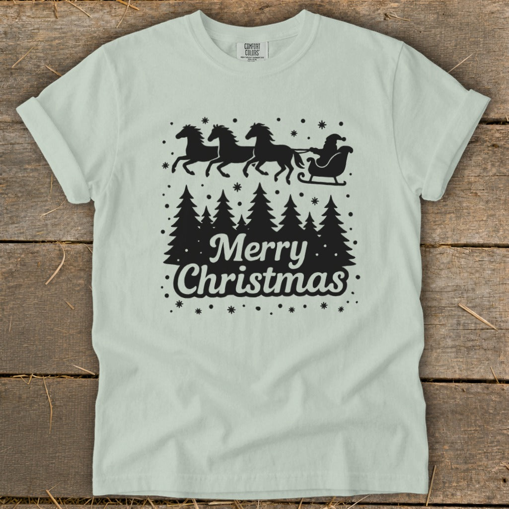 Light green t-shirt with black Merry Christmas text and Santa's sleigh with horses graphic.