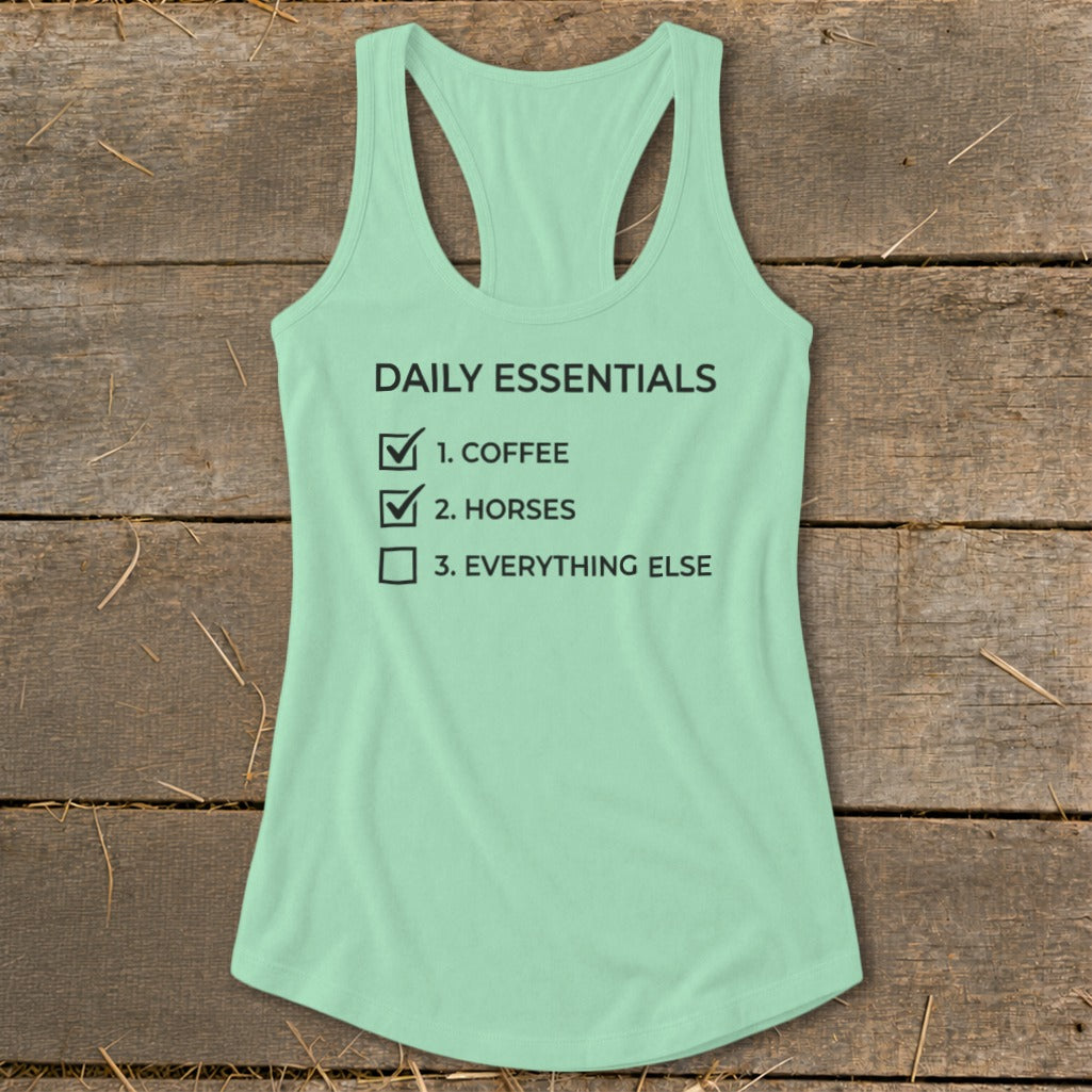 Mint green tank top with "Daily Essentials" checklist for coffee and horses.