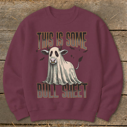 Cow wearing a ghost costume with text "This is some Bull Sheet".