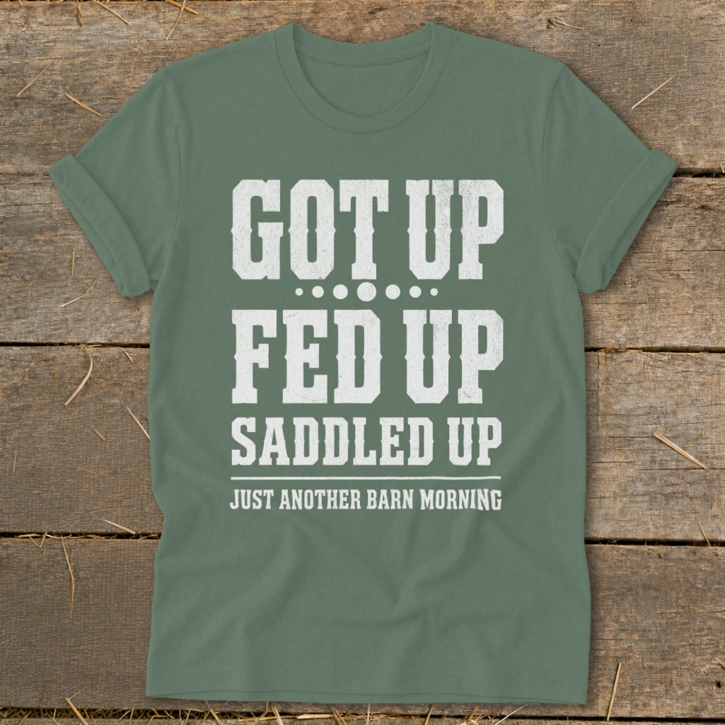 Green t-shirt with text "GOT UP FED UP SADDLED UP JUST ANOTHER BARN MORNING"