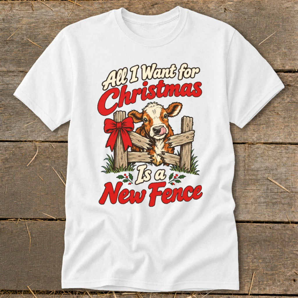 White t-shirt with cow, fence, and "All I Want for Christmas Is a New Fence" text.