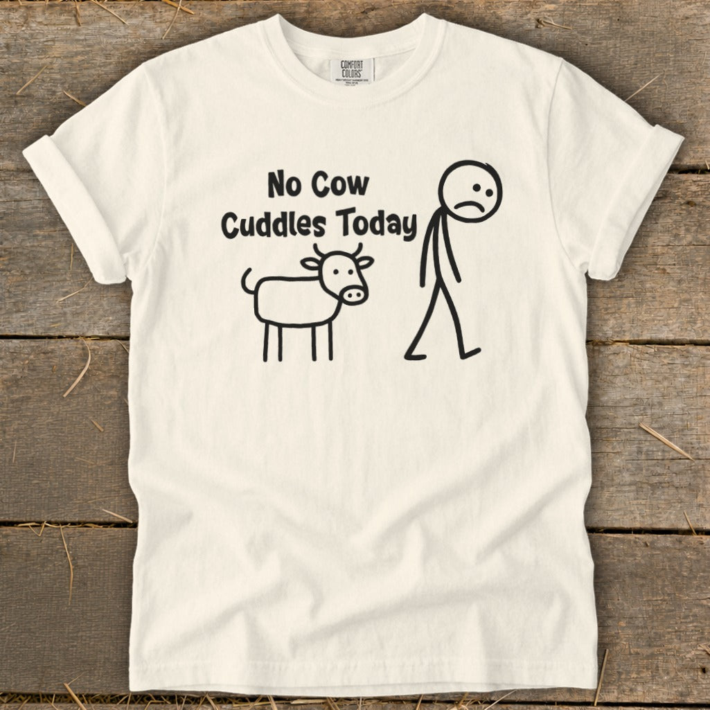White t-shirt with "No Cow Cuddles Today" text and stick figures of a cow and sad person.