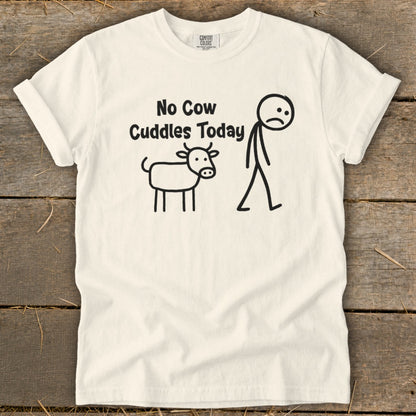 White t-shirt with "No Cow Cuddles Today" text and stick figures of a cow and sad person.