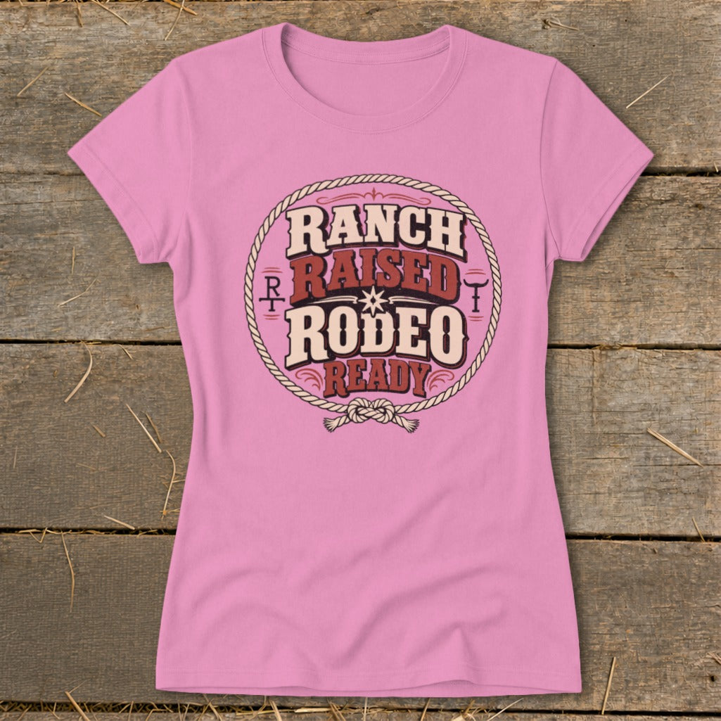 Pink t-shirt with "Ranch Raised Rodeo Ready" text in a circle.