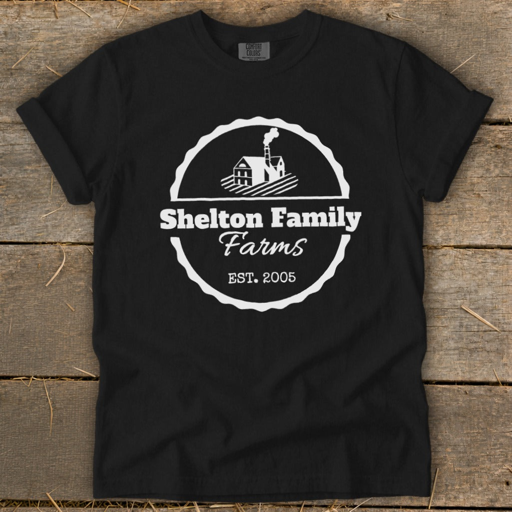 Black t-shirt with "Shelton Family Farms EST. 2005" logo and farm graphic.