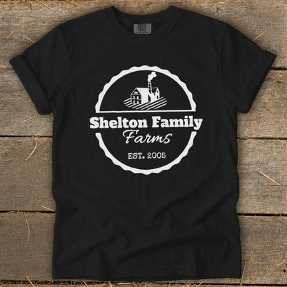 Black t-shirt with "Shelton Family Farms EST. 2005" logo and farm graphic.