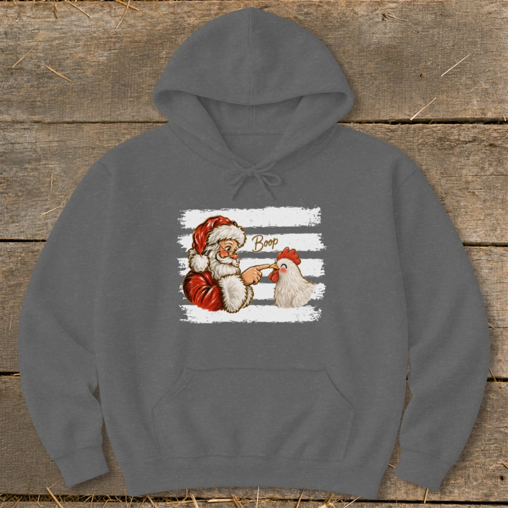 Santa boops a chicken on the beak with the word "Boop" above.