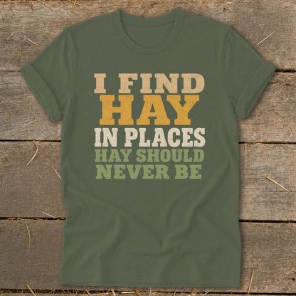 Green t-shirt with text: I FIND HAY IN PLACES HAY SHOULD NEVER BE.