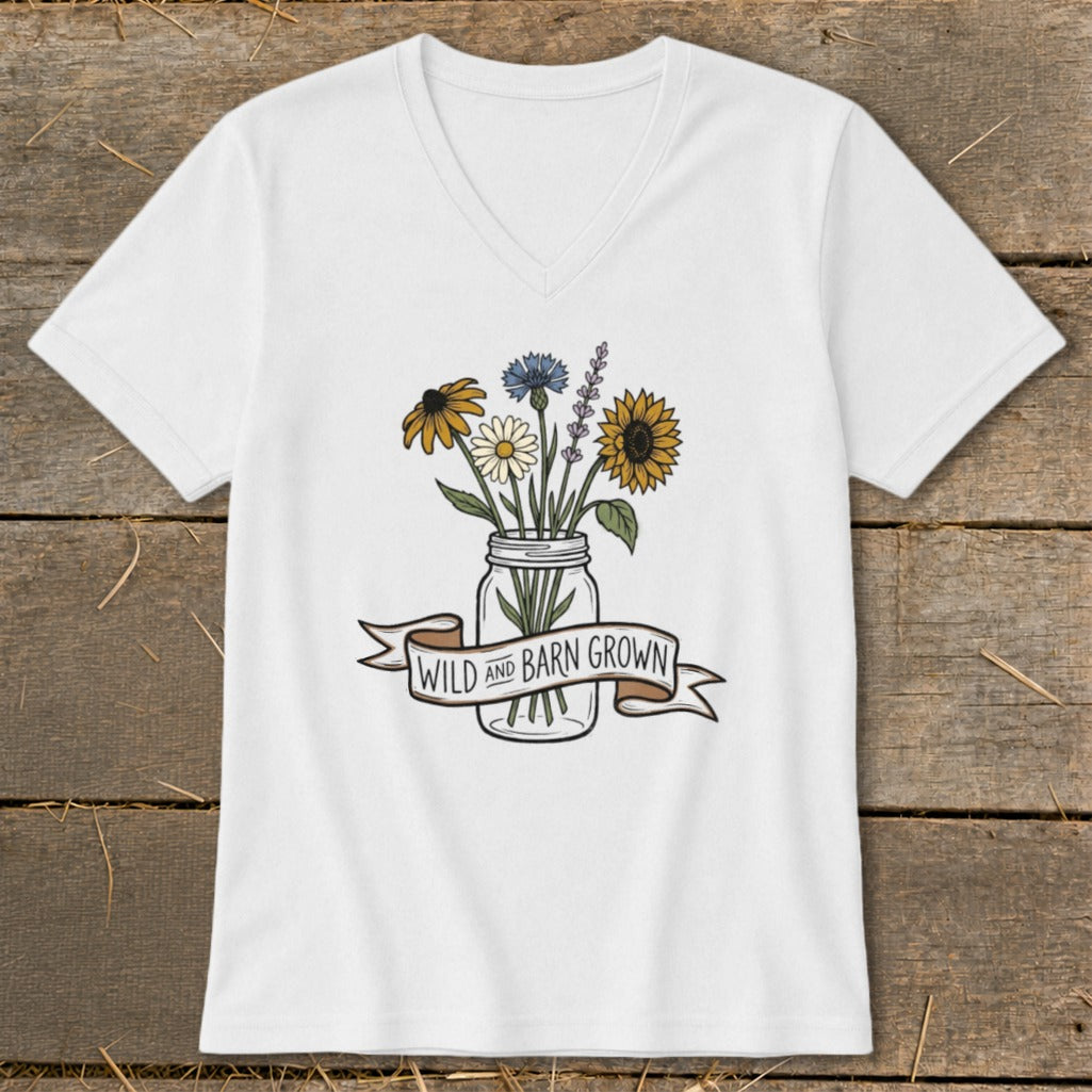 White v-neck t-shirt with a mason jar of wildflowers and "Wild and Barn Grown" banner.