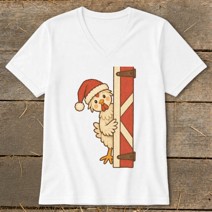 White v-neck t-shirt featuring a chicken wearing a Santa hat peeking from behind a barn door.