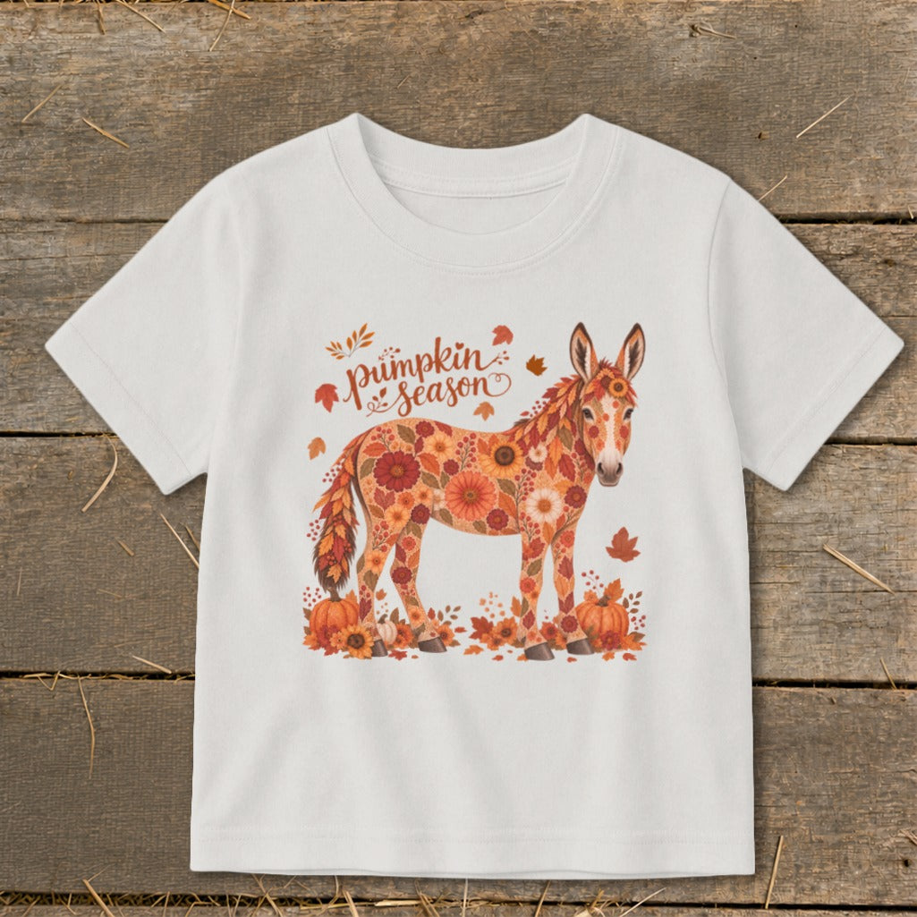 White t-shirt with floral donkey and "pumpkin season" text.