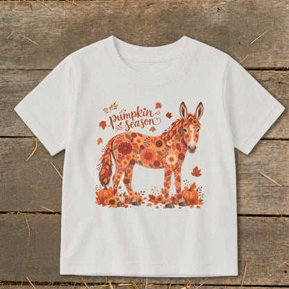White t-shirt with floral donkey and "pumpkin season" text.
