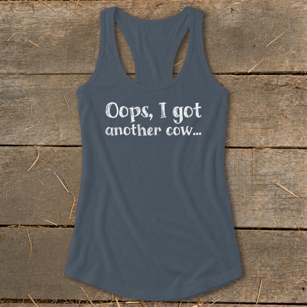 Gray racerback tank top with white text "Oops, I got another cow..."